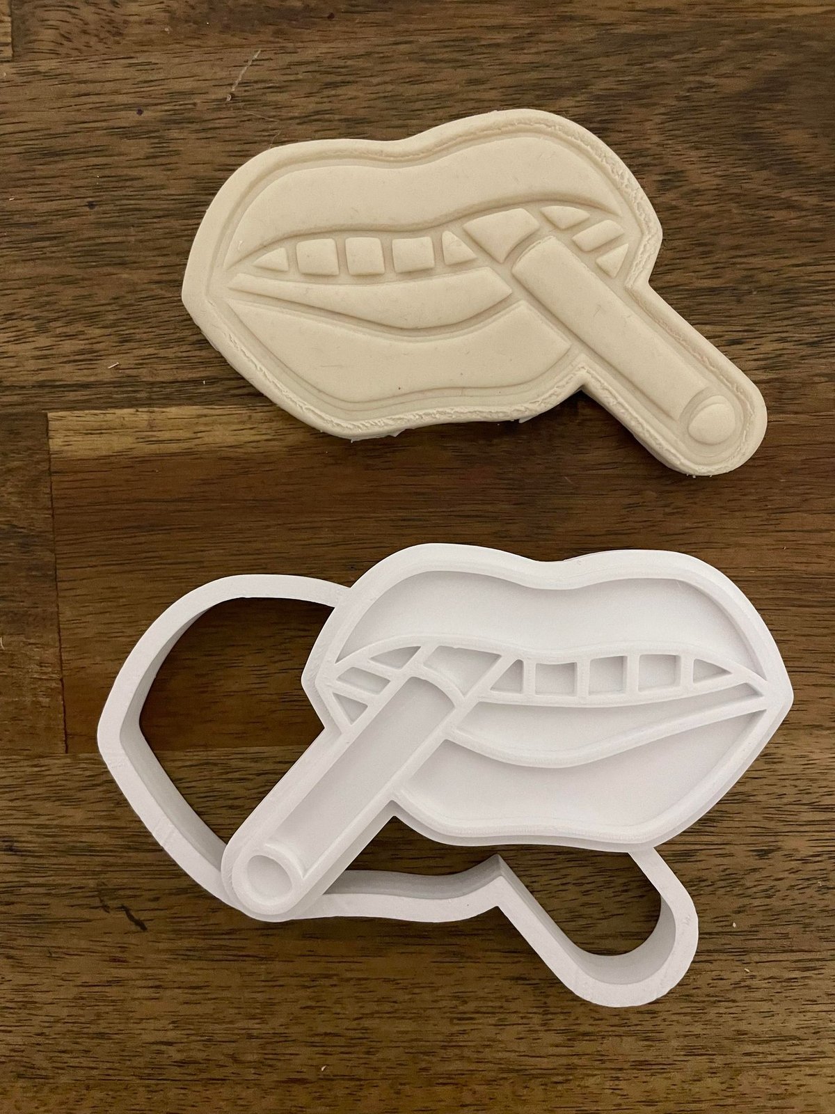 Mouth with Cigarette Stamp and Cutter