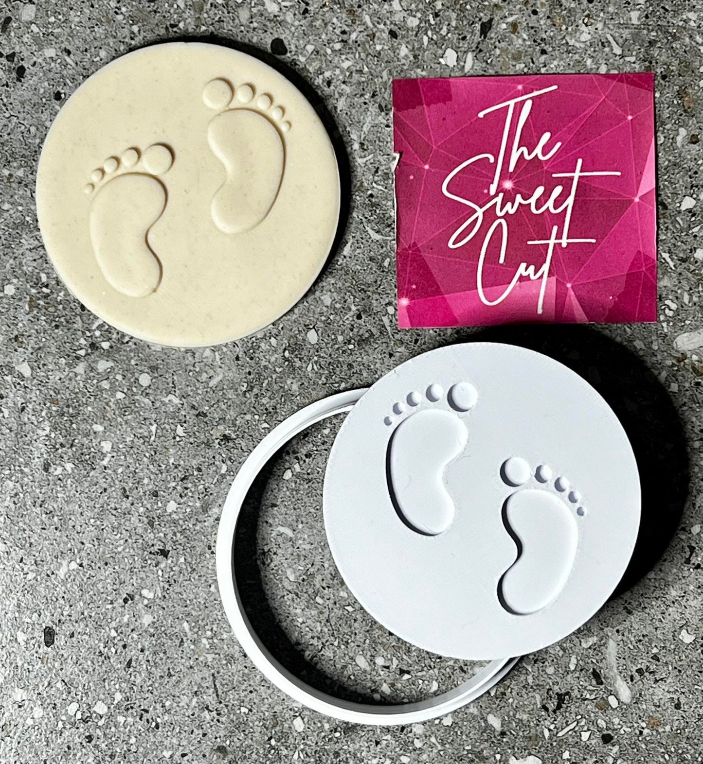 Baby feet with stamp with cutter