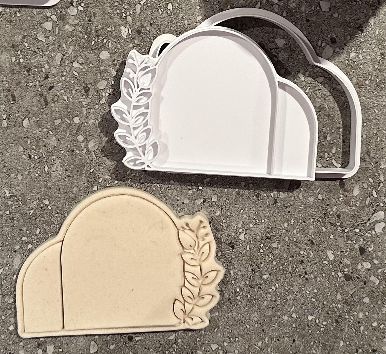 Double arch with flower on right stamp and cutter
