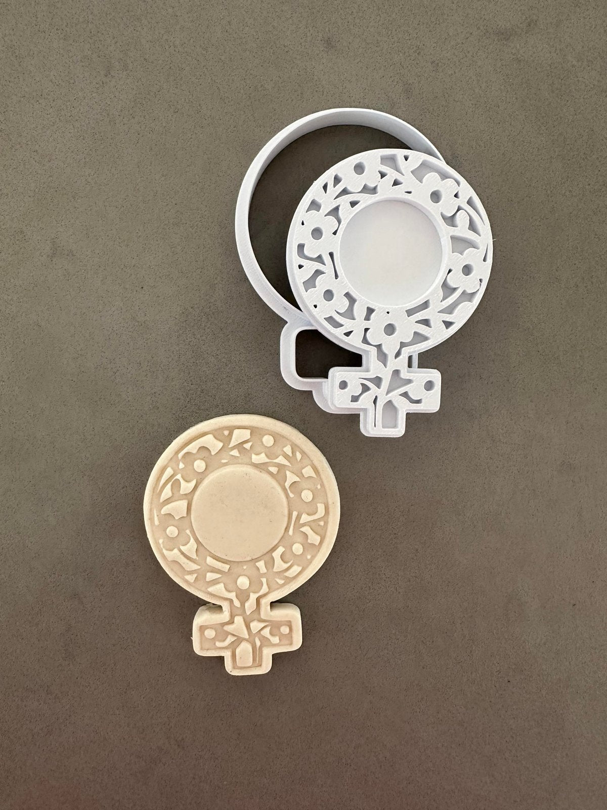 Women symbol with flowers stamp and cutter