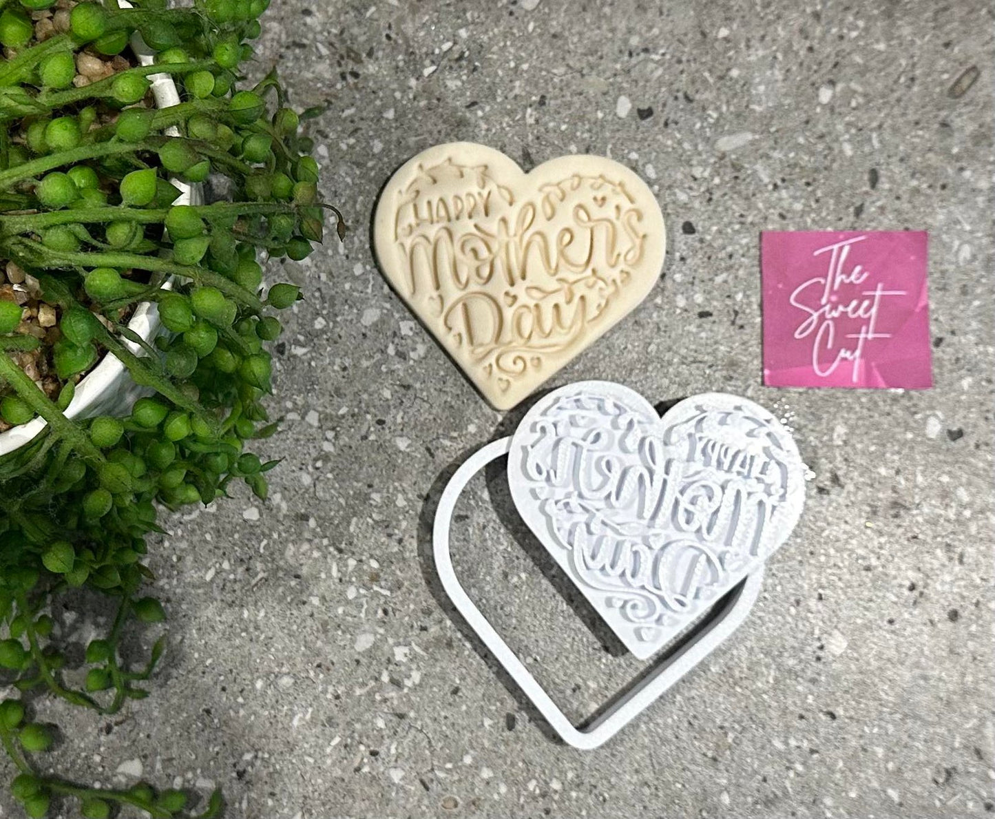 Happy Mother's Day in heart with heart cutter