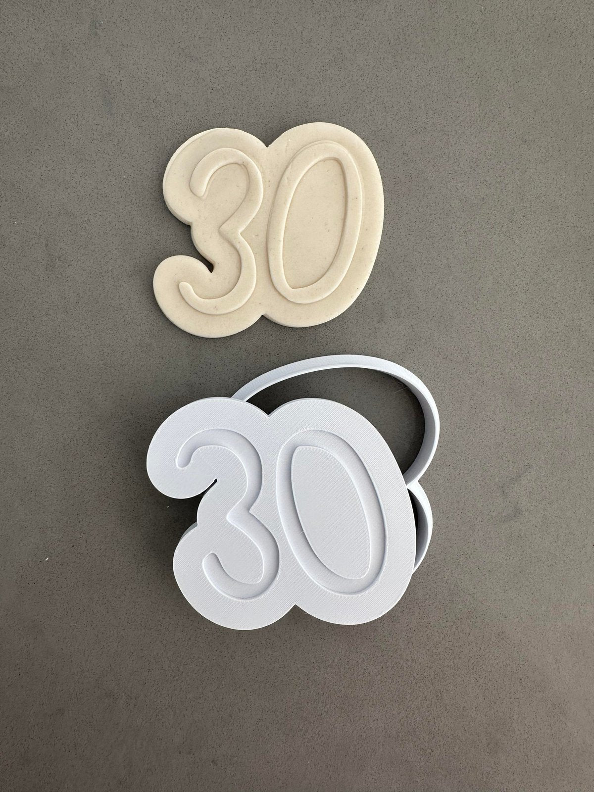 Thirty number debosser and cutter