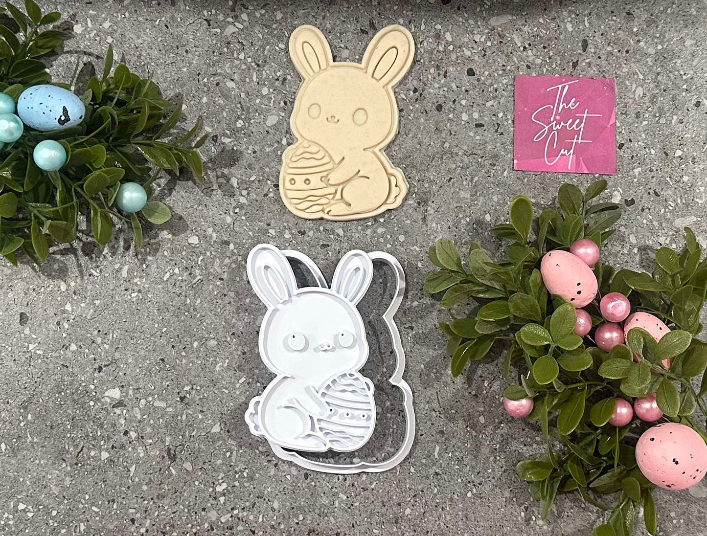 Bunny holding an egg stamp and cutter