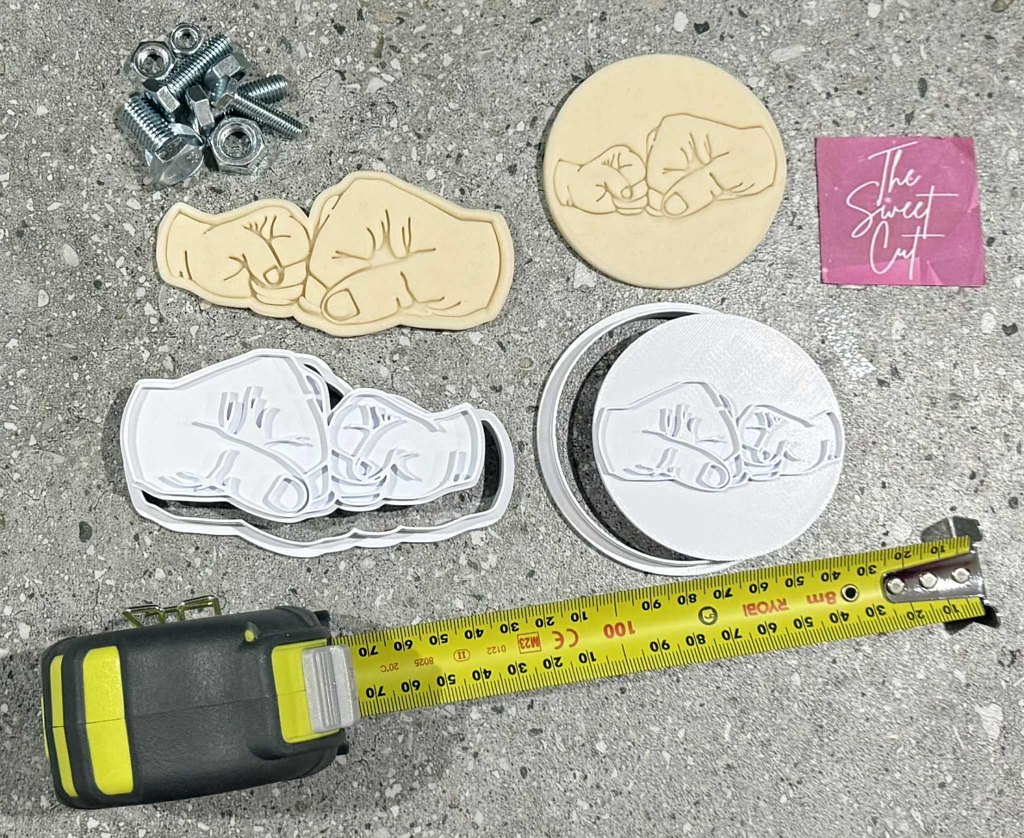 Fist pump stamp and cutter