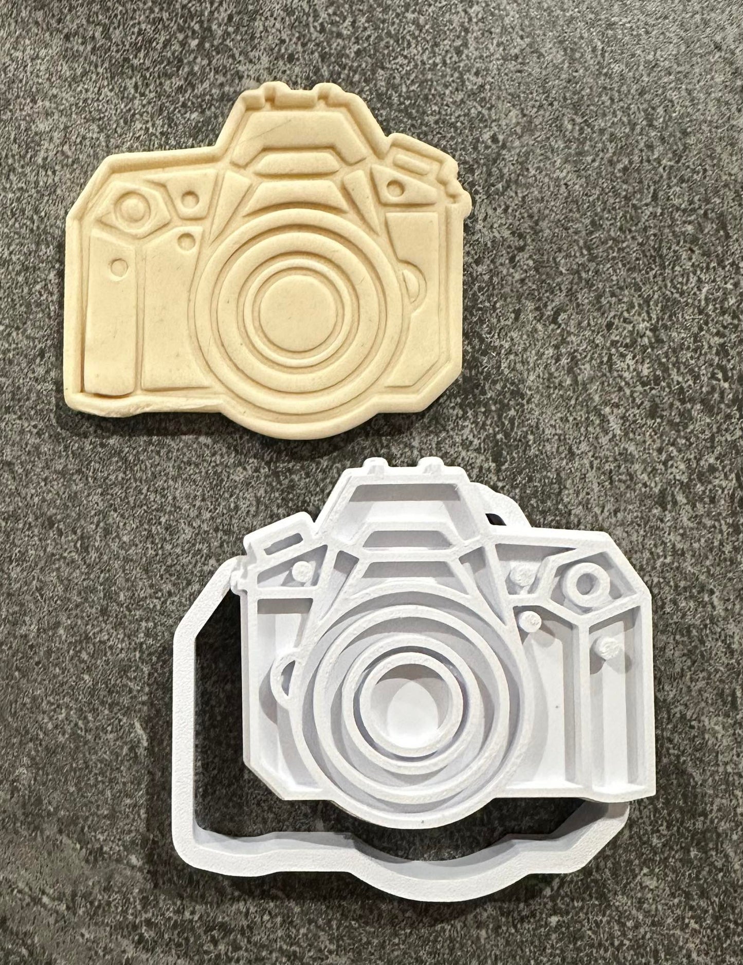 Camera stamp and cutter