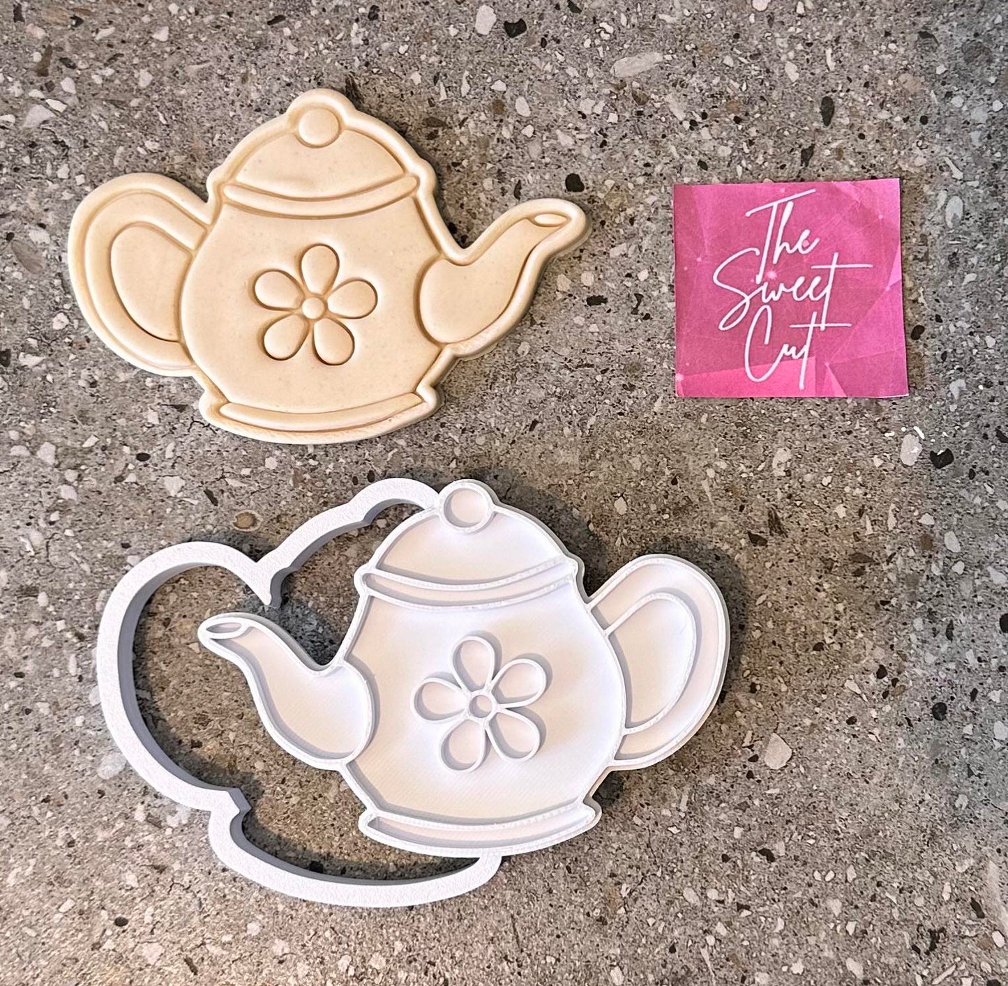 Tea pot with daisy stamp and cutter