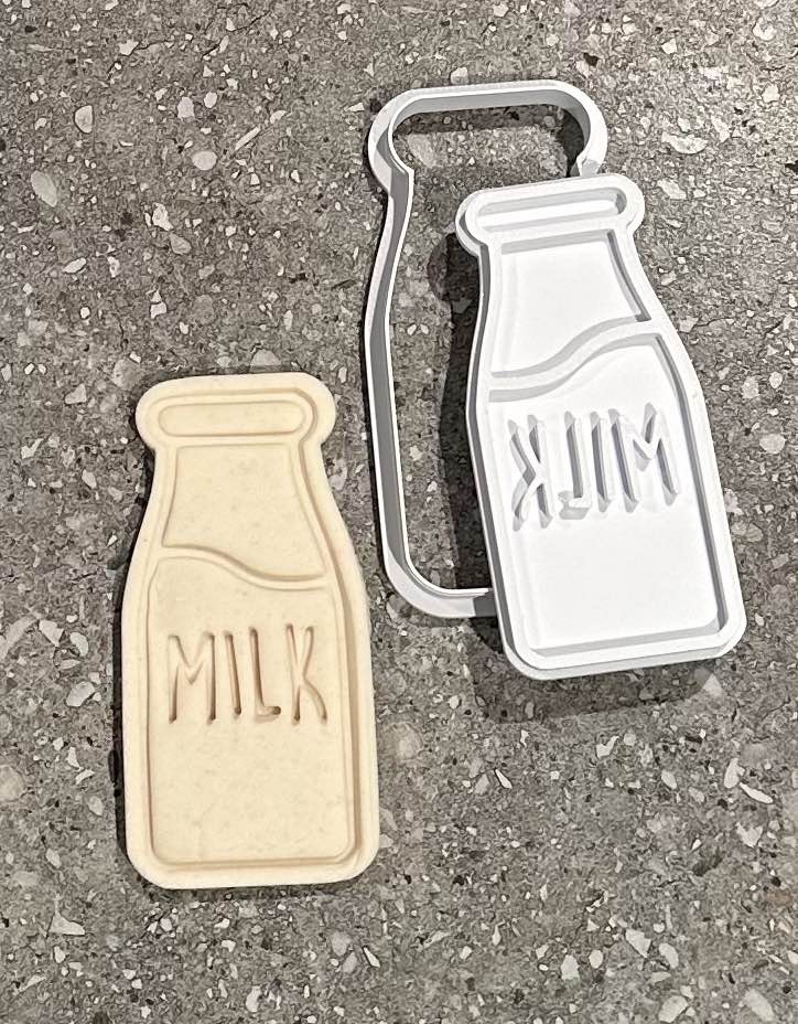 Milk bottle with cutter